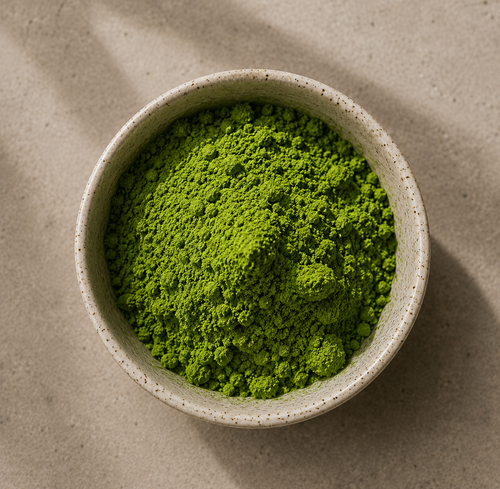 Finely ground Japanese Ceremonial Grade Matcha powder in a ceramic bowl